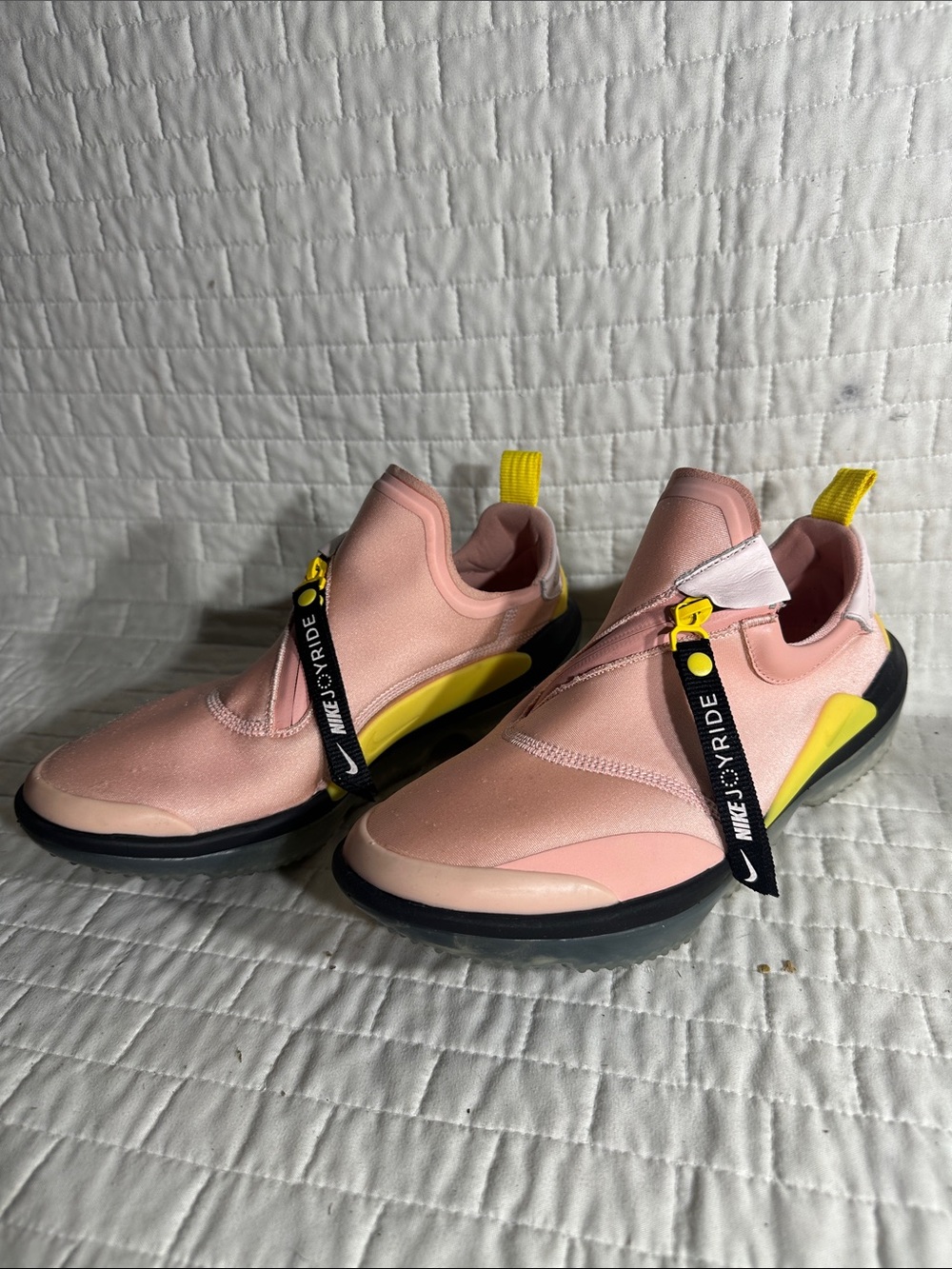 Nike Joyride Optik women's sneakers in the coral stardust and chrome yellow